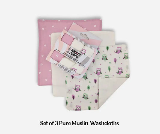 Set of three baby muslin washcloths in pink, white, and owl print patterns.