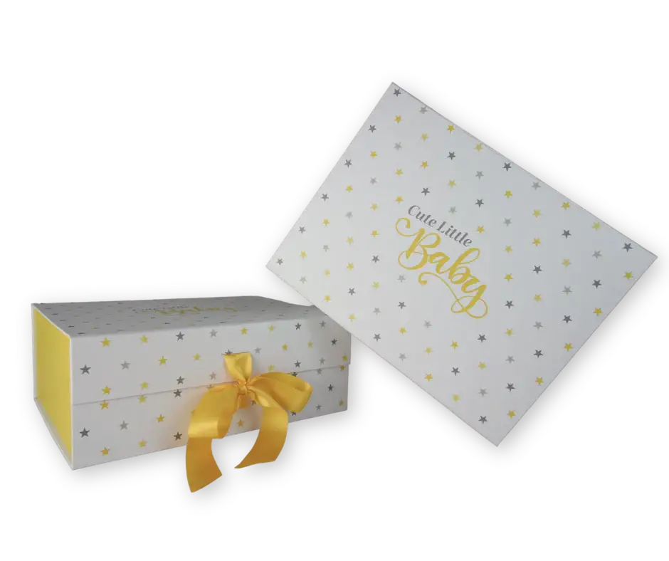Yellow baby gift boxes with star pattern, ribbon, and 'Cute Little Baby' text on lid