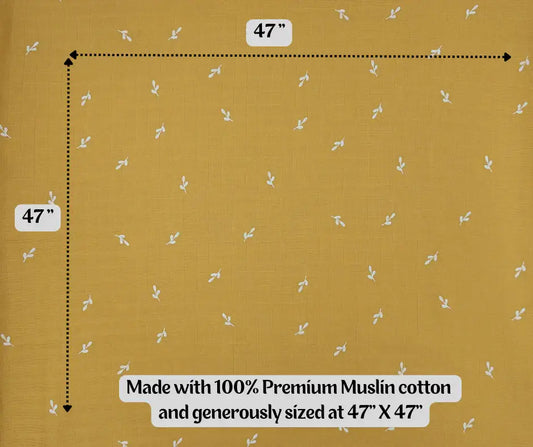 Yellow ochre muslin swaddle blanket, 47 x 47 inches, with small white leaf pattern.
