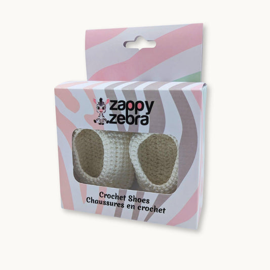 Zappy Zebra crochet shoes packaging on a white background